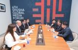 Hikmət Hacıyev Qazaxıstanın İnformasiya Komitəsi rəsmisi ilə görüşüb